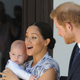 Britain’s Prince Harry and Meghan, Duchess of Sussex, holding their son Archie, meet with Anglican Archbishop Emeritus, Desmond Tutu, and his wife Leah in Cape Town, South Africa.